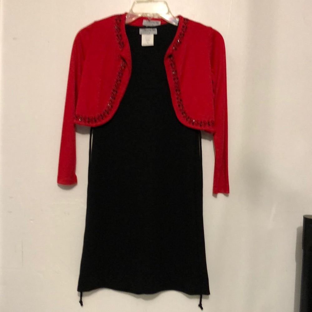 Black dress with red sweater